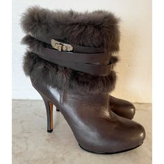 Great Condition With Little Wear And No Major Flaws. On The Left Boot, On The Top There Is Wrinkling. Material Appears To Be A Soft Leather And Real Fur. Has Nonadjustable Decorative Buckles Around The Ankles. 4.4” Heel Height Shaft Height 5” Ankle Circumference On The Interior Is 10.25” Approximate Weight 1.5 Lbs. Original Box Not Included. Winter Brown Coach Boots, Leather Ankle Strap Boots For Winter, Winter Leather Boots With Ankle Strap, Designer Winter Ankle Boot Heels, Leather Winter Evening Booties, Leather Evening Booties For Winter, Designer Ankle Boot Heels For Winter, Winter Evening Leather Booties, Luxury Leather Coach Heels