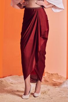 Shop for S&N by Shantnu Nikhil Maroon Poly Jersey Asymmetric Draped Skirt for Women Online at Aza Fashions Blouse Draping Pattern, Draped Skirt Outfit Western, Maroon Summer Dress, Cowl Skirt Draping, Skirts For Hip Dips, Skirt Draping Pattern, How To Make Drape Skirt, Wrap Drape Skirt Pattern, Cocktail Skirt Outfit