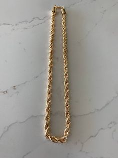 "14K Gold 5MM Rope Chain Necklace*Layering Gold Chain Necklace*14K Gold Filled Chain Choker Necklace*Rope Link Chain Choker* Rope Choker ------------------------------------------------- ♦ --------------------------------------------------- This beautiful 14K gold filled necklace can be worn as a choker, as a layering piece and it will add a statement to your outfit. It can be combined with multiple chains of different lengths to give the messy chains look. It comes available in 14K gold filled Gold Rope Chain Necklace, Round Shape, Gold Plated Cuban Link Rope Chain Necklace, Yellow Gold Necklaces With Cuban Link Rope Chain, Yellow Gold Necklace With Cuban Link Rope Chain, Gold Necklaces With Rope Chain And Link Shape, Gold Rope Chain Necklace, Necklace Layering Gold, Necklace Rope, Gold Circle Necklace