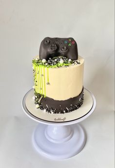 a cake with a video game controller on top