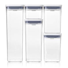 four clear plastic containers with lids on each side and one empty container in the middle