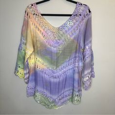 Nwot Soft Surroundings Lulu Tunic Crochet Top Size S Rainbow Tie Dye Soft Surroundings Lulu Tunic Top Crocheted Details Double V-Neckline V-Bottom Trim Beautiful Pastel Multi-Colored This Top Can Be Worn In Many Ways! As A Comfy Beautiful Top With A Tank Under.Off One Shoulder.. As A Cover Up At The Beach And Pool! This Top If Truly Beautiful! Multicolor Crochet Top For Spring Beach Cover-up, Yellow Bohemian Crochet Top For Festival, Yellow Crochet Top With Crochet Trim For Spring, Spring Yellow Crochet Top With Crochet Trim, Purple Crochet Top For Summer Festival, Yellow Bohemian Top With Crochet Trim, Yellow Bohemian Crochet Top For Vacation, Purple Bohemian Crochet Top For Summer, Bohemian Purple Crochet Top For Summer