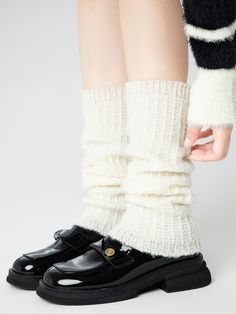 Embrace the chill of autumn and winter with these delightful leg warmers, available in classic shades of white, black, and gray. Crafted from a soft, cozy knit, these leg warmers are designed to keep you warm and stylish all season long. Fitted White Knee-high Socks For Winter, Warm Beige Winter Socks, Warm Beige Socks For Winter, Cozy Knee-high Winter Socks, Winter Acrylic Socks, Cozy Beige Leg Warmers For Fall, One Size Knee-high Socks For Fall, Warm Acrylic Winter Socks, Casual Acrylic Winter Socks