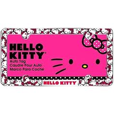 the hello kitty license plate is pink with white polka dots and a black cat on it