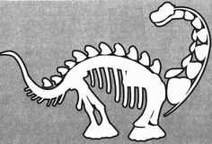 a stencil drawing of a dinosaur that is white and has black outline on it