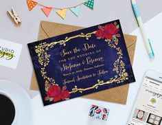 a wedding card with roses on it next to a cup of coffee and other items