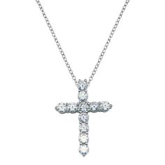 Silver 925 Clear CZ Rhodium Plated Classic Cross Pendant Necklace FinishNickel Free Rhodium Plated Chain Length16 + 2 Inches Extension Stone11 Cubic Zirconia Stones Metal925 Sterling Silver ---> ❥ We welcome customization. Change  design as  your need can be done.  We are just a message away ---> ⌛ Processing time: We need 4 to 5 working days to make your items by hand, since we receive your payment or if you want your item much sooner you place your order with express shipping and contact us we'll make your order in 2 to 3 days or earlier. ---> ↻ Return Policy: If you need to return the item, please contact us first. - We offer a 14 day money back guarantee for all purchases, but you have to tell us the reason what's issue with the product (EXCEPT items that are custom-made, discounted). Anniversary Silver Cross Necklace With Brilliant Cut, Silver Diamond Cut Cross Necklace For Anniversary, Silver Diamond-cut Cross Necklace For Anniversary, Silver Sterling Silver Cross Necklace With Diamond Cut, Sterling Silver Diamond Cut Silver Cross Necklace, Sterling Silver Cross Necklace With Vvs Clarity For Anniversary, Classic Sterling Silver Cross Necklace With Diamond Cut, Formal Silver Diamond Cross Necklace, Silver Cross Necklace With Diamond Cut Cubic Zirconia