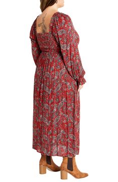 A bold print makes a statement on a billowy maxi dress with a notched neckline and long sleeves featuring ruffle-trimmed cuffs. 51" length Slips on over head Square neck Long sleeves with elastic cuffs 100% viscose Hand wash, line dry Imported Billowy Long Sleeve Floral Maxi Dress, Fall Paisley Print V-neck Maxi Dress, Fall Paisley Print Maxi Dress With V-neck, Flowy Long Sleeve Paisley Print Midi Dress, Flowy Long Sleeve Midi Dress With Paisley Print, Floral Long Sleeve Dress, Notched Neckline, Long Sleeve Floral Dress, City Chic