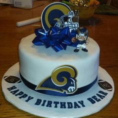 a birthday cake decorated with the rams logo