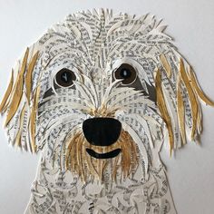 a dog made out of old book pages