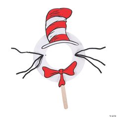 a cat in the hat lollipop on a stick