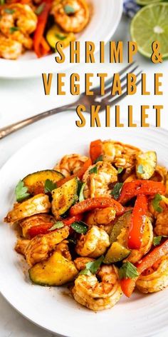 shrimp and vegetable skillet on a white plate with a lime wedge in the background