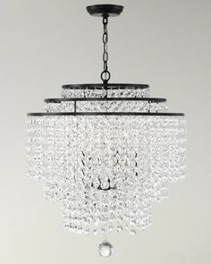 a crystal chandelier hanging from the ceiling