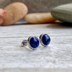 ★Metal- Sterling Silver★Stone- Genuine Lapis Lazuli★Size- 6mm diameter★Arrives ready for gifting and usually ships same day or next day. Check shop announcement for occasional delays.Lapis lazuli is a deep-blue stone which has been prized since antiquity for its intense color and has been one of the most sought after stones in use since man's history began. Its deep, celestial blue remains the symbol of royalty and honor, gods and power, spirit and vision. It is a universal symbol of wisdom and Blue Spiritual Earrings For Gifts, Blue Round Stone Earrings For Gift, Adjustable Lapis Lazuli Earrings As Gift, Adjustable Lapis Lazuli Earrings For Gift, Everyday Blue Earrings With Natural Stones, Round Lapis Lazuli Jewelry For Gifts, Minimalist Round Lapis Lazuli Jewelry, Round Lapis Lazuli Gemstone Earrings, Blue Cabochon Gemstones For Gift