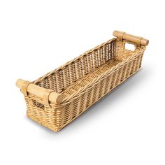 an empty wicker basket with handles on a white background