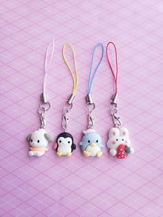 Kawaii animal phone charms! Super cute and can be used on purses, bookbags, or anything with a zipper/lobster claw. They can also be looped into a hole in your phone case to be a phone charm.  Animal charm numbers: #1 (dog) #2 (black penguin) #3 (blue penguin) #4 (bunny) Cute White Keychains For Everyday Use, Cute Handmade Multicolor Keychains, Cute White Keychains For Personal Use, Cute White Keychain, Keychain Y2k, Character Keychain, Blue Penguin, Y2k Phone, Cute Character