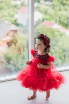 Welcome to our children's fashion store, where we are delighted to present our enchanting new children's tulle dress! This unique dress is perfect for the most important children's events and celebrations. Below the Knee Length: This dress is designed to make little princesses feel special. The below the knee length adds elegance and allows little ones to move freely and dance at parties and festivities. Checkered Top: The combination of tulle with a checkered top creates a stylish and unique look. The checkered pattern adds a playful touch and classic elegance at the same time. Puffy Tulle Wing Sleeves: This feature will give your little girl a truly fairy-like appearance. Wing-style sleeves add volume and childlike delicacy. They will surely delight your daughter and make her outfit uniq Birthday Dress Short, Xmas Photoshoot, Plaid Christmas Dress, Gown Birthday, Red Plaid Christmas, Checkered Top, Christmas Toddler, Wing Sleeves, Unique Dress