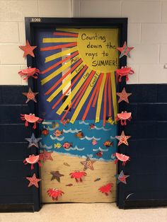 a door decorated with paper stars and the words counting down the days of summer