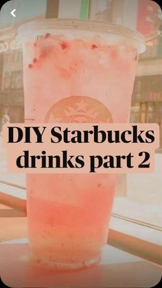 a pink drink sitting on top of a table next to a window with the words diy starbuckss drinks part 2