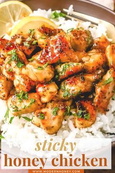 the chicken is served on top of rice and garnished with parsley