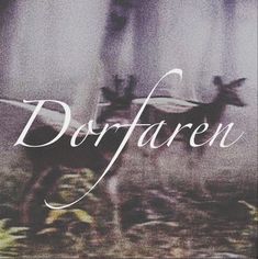 blurry photograph of deer in front of trees with the word dorffaren on it