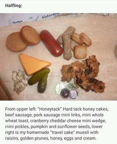 a table topped with lots of different types of food on top of a white towel