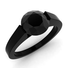 a black diamond ring is shown on a white background, with the center stone in the middle