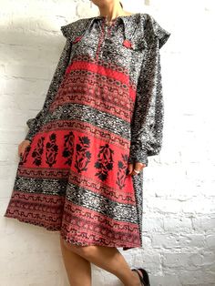 "This is oversized baggy style black tunic dress super comfortable light maxi caftan style with big collar made in soft and flowy material, with floral patterns perfect outfit for many winter ocassions and parties also loose enough to fit during pregnancy MEAESURE shoulder 21\" bust up to 46\" very loose waist and hips length 43\" MATERIAL *poliester, no lining Thank You for looking" Folk Style Floral Print Maxi Dress, Folk Style Long Sleeve Floral Print Dress, Folk Style Long-sleeved Floral Print Dress, Bohemian Flowy Patterned Midi Dress, Bohemian Boho Print Midi Dress, Flowy Boho Dress With Patterned Print, Flowy Patterned Boho Dress, Flowy Patterned Boho Dress With V-neck, Patterned Flowy V-neck Boho Dress