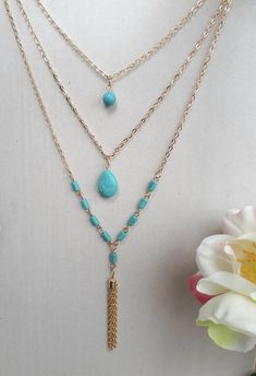 Beautiful gold plated three layer necklace features, howlite turquoise beads and tassel is sure to gain many compliments. Pocahontas Necklace, Multi Strand Necklace Gold, Three Layer Necklace, Disney Princess Pocahontas, Gift Box Wrapping, Handmade Turquoise Jewelry, Turquoise Jewelry Set, Box Wrapping, Layered Necklace Set