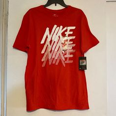 Nike Athletic Cut T-Shirt. Men’s L. Red In Color With Nike Written In White On The Front. New With Tag. Nike Casual T-shirt In University Red, Nike Red Graphic Tee, Nike Red Graphic Tee Top, Nike Athletic Fit T-shirt With Graphic Print, Yellow Shirt Men, Affordable Red Nike T-shirt, Nike Multicolor Short Sleeve T-shirt, Urban Red Sports T-shirt, Raiders Shirt