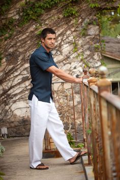 Men's Linen Navy Blue Short Sleeve Italian Shirt for Beach Weddings... A sleek and sexy, button-down, short sleeve Italian dress shirt with a 'Roma' spread collar and straight-cut hem. If you're looking for a timeless, elegant linen shirt, try this best-seller: our ever-popular Linen Amalfi Shirt. A staple for any summer wardrobe and perfect for your beach wedding! Pairs well with our Linen Amalfi Pants for a complete outfit. Washable. 100% linen. Fitted Collared Short Sleeve Shirt For Beach, Fitted Collared Short Sleeve Beach Shirt, Spring Semi-formal Shirt With Cuffed Sleeves, Fitted Button-up Shirt For Vacation, Fitted Button-up Short Sleeve Shirt For Vacation, Casual Fitted Short Sleeve Shirt For Vacation, Fitted Collared Camp Shirt For Beach, Fitted Casual Short Sleeve Shirt For Vacation, Semi-formal Summer Shirt With Spread Collar