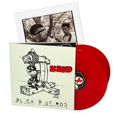 a red vinyl album with an image of a robot on it and the words mind