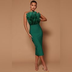 Product Details Bandage Midi Dress Tube Feather Detail Back Zipper Stretch Disclaimer: Feather Fall Out May Happen. 100% Polvester Imported Socialite Style, Mid Skirt, 파티 드레스, Sleeveless Skirt, Mid Calf Dresses, Bandage Midi Dress, Club Party Dresses, فستان سهرة, Body Con Dress