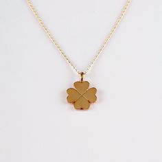 With the Clover Design 14K Gold Necklace for Women and Girls, available in an array of captivating colors, the promise of timeless elegance and romantic charm will soon elevate your accessory collection. This necklace will effortlessly combine sophistication with a touch of whimsy, thanks to its intricately crafted clover motif. Symbolizing good fortune and new beginnings, it will become a cherished piece that enhances any outfit with its delicate design and vibrant color options. Whether marking a special occasion or simply adding a stylish flair to your everyday look, this necklace will bring both joy and a hint of luxury to your ensemble. As you wear this elegant piece, its exquisite craftsmanship and versatile design will make it a standout accessory, perfect for various occasions and Elegant Engraved Gold Plated Charm Necklaces, Formal White Gold 14k Charm Necklaces, Elegant Yellow Gold Engraved Charm Necklaces, Elegant 14k Gold Hallmarked Charm Necklace, Delicate Polished Gold Jewelry, Classic Yellow Gold Charm Necklace With Clavicle Chain, Classic Yellow Gold Clavicle Chain Charm Necklace, 14k Gold Flower Pendant Jewelry Gift For Her, 14k Gold Flower Pendant Necklace