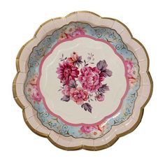 a pink and blue plate with flowers on it