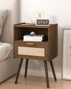 a night stand with two drawers on one side and a basket drawer on the other