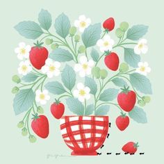 a red basket with strawberries and flowers in it