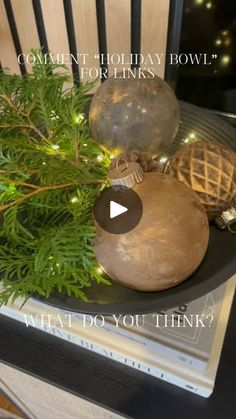 a wooden chair with ornaments on it and the words, comment holiday bowl for links what do you think?