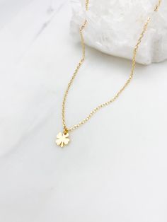 Good luck necklace, gold necklace, dainty gold necklace, dainty jewelry, gift for her, necklace, four leaf clover, jewelry, graduation gift Tiny gold clover pendant necklace D E T A I L S *7mm tiny gold plated four leaf clover pendant *Gold plated cable chain *Select your perfect length SHIPPING: *Free domestic shipping on all orders PACKAGING: *All pieces come beautifully packaged, perfect for gift giving. Find more to ❤️ here: http://etsy.com/shop/thejewelrystandard Orders Packaging, Gold Necklace Dainty, Luck Necklace, Good Luck Necklace, Clover Jewelry, Four Leaf Clover Necklace, Clover Pendant, Dainty Gold Necklace, Clover Necklace