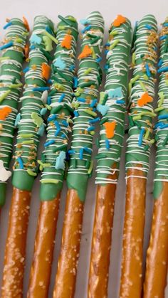 there are many sticks that have been made to look like carrots and pretzels