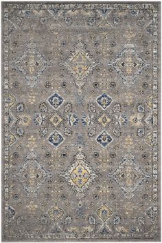 an area rug with many different colors and patterns on the carpet, including blue, gray,