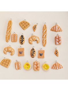 a bunch of different types of food charms