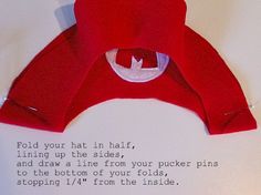 a red jacket hanging on a wall with a poem written in white writing below it