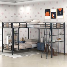 a bunk bed in a room with pink and white wallpaper on the walls behind it