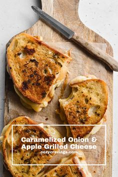 grilled onion and apple grilled cheese sandwiches on a cutting board