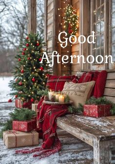 a wooden bench sitting next to a christmas tree with presents on it and the words good afternoon