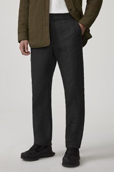 The Carlyle Quilted Pant is made with Nylon Pongee for water-repellent, wind-resistant protection with a smooth, sheen finish. It has an elasticized waistband and zipper fly and is equipped with two front side-entry pockets and a single back welt pocket,  providing optimal comfort with simple aesthetics. The Carlyle Pant is insulated with 100% TENCEL™ Lyocell, a biodegradable fibre made from wood pulp harvested from sustainably managed forests, with the same performance qualities as its down cou Simple Aesthetics, Quilted Pants, The Carlyle, Men Parka, Baby Outerwear, Mens Parka, Snow Pants, Bottom Clothes, Black Label