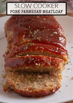 the meatloaf has been sliced and is ready to be eaten on the plate