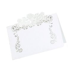 a white card with an intricate design on it