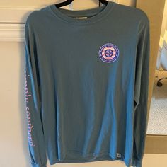 Small Long Sleeve T. Pre-shrunk Blue Crew T-shirt, Blue Soft-washed Long Sleeve T-shirt, Blue Crew Neck Screen Print Top, Blue Crew Neck Top With Screen Print, Blue Pre-shrunk Crew T-shirt, Gray Long Sleeve Pre-shrunk T-shirt, Soft-washed Gray Long Sleeve T-shirt, Blue Crew Neck Top With Graphic Print, Blue Graphic Print Crew Top